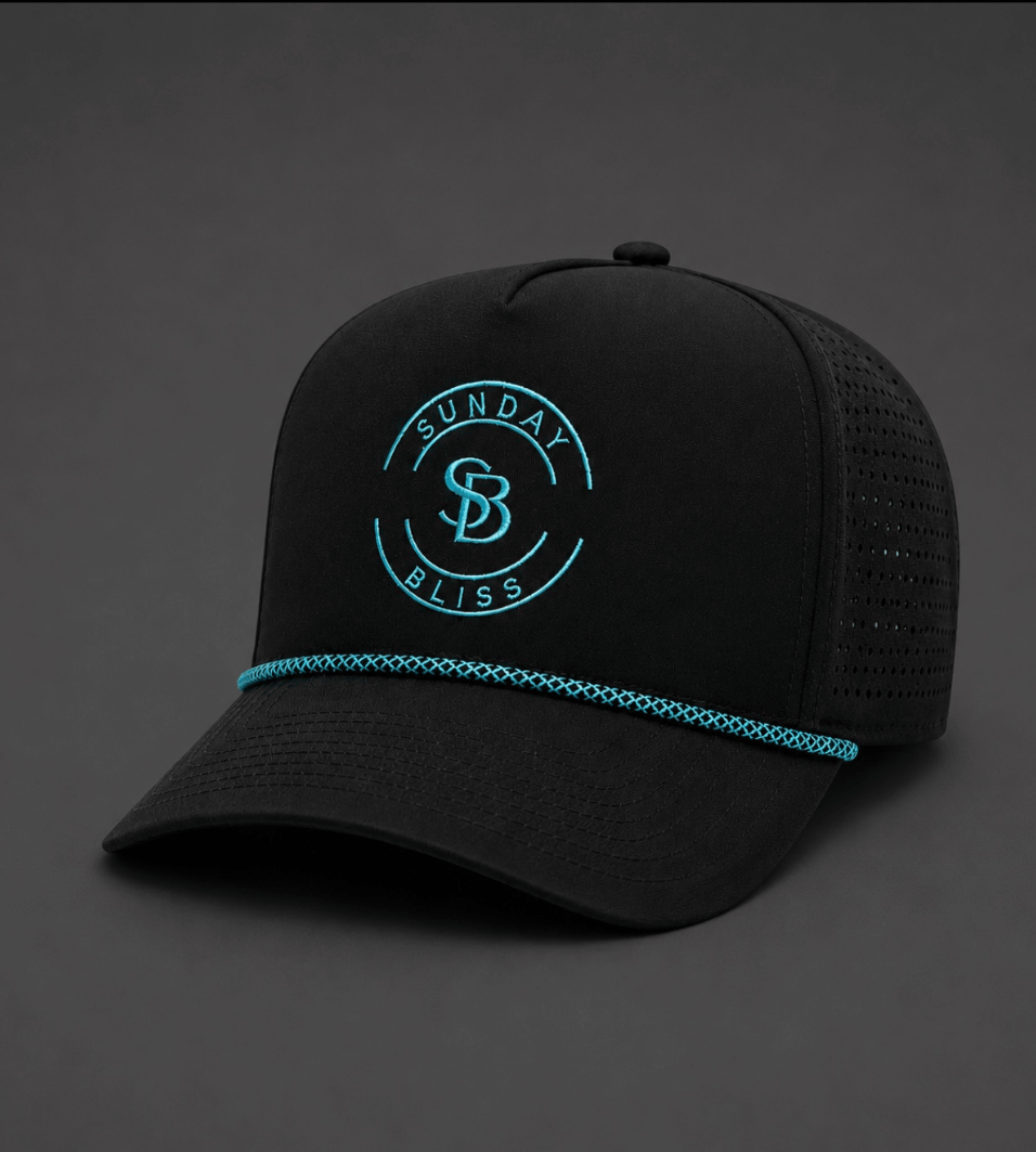 Sunday Bliss Classic — Black golf cap with turquoise details on a dark background.